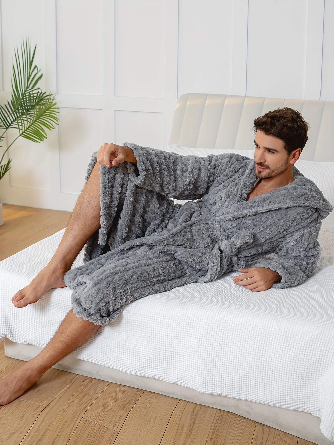 Peignoir homme effet torsadé en tissu éponge à capuche