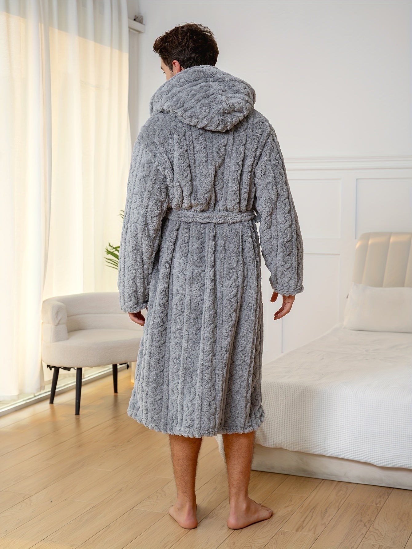 Peignoir homme effet torsadé en tissu éponge à capuche
